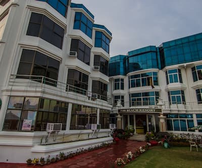 https://imgcld.yatra.com/ytimages/image/upload/t_hotel_yatra_city_desktop/v1424072000/Domestic Hotels/Hotels_Puri/Hotel Puri Beach Resort/Exterior.jpg